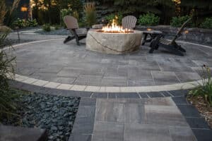 pavers around fire pit create outdoor space