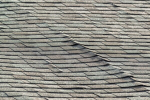 sagging asphalt shingled roof